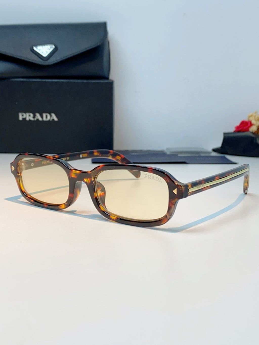 Prada Metal Oval Brown Lens Sunglasses for Men & Women - 382673