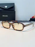 Prada Metal Oval Brown Lens Sunglasses for Men & Women - 382673