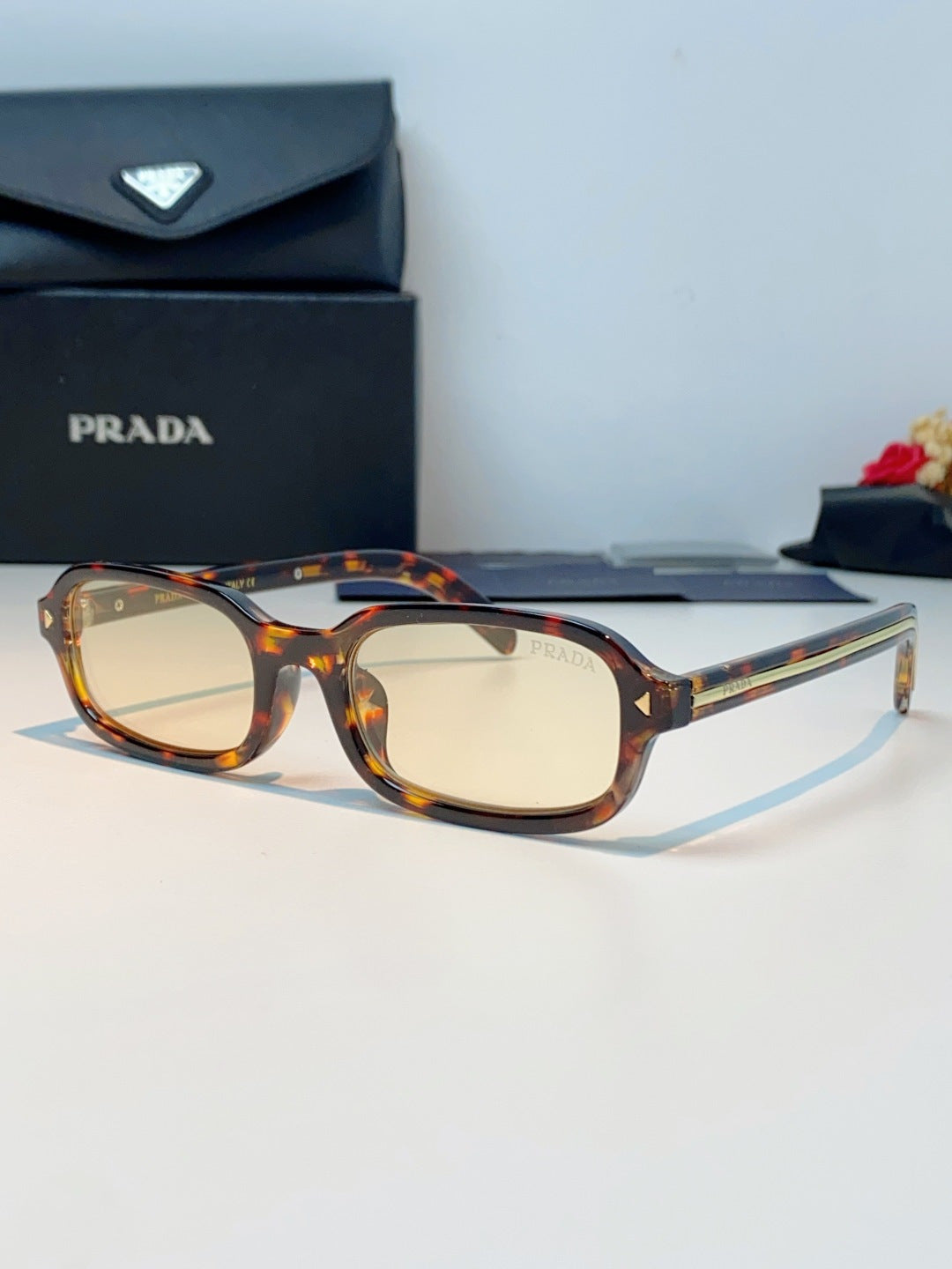 Prada Metal Oval Brown Lens Sunglasses for Men & Women - 382673