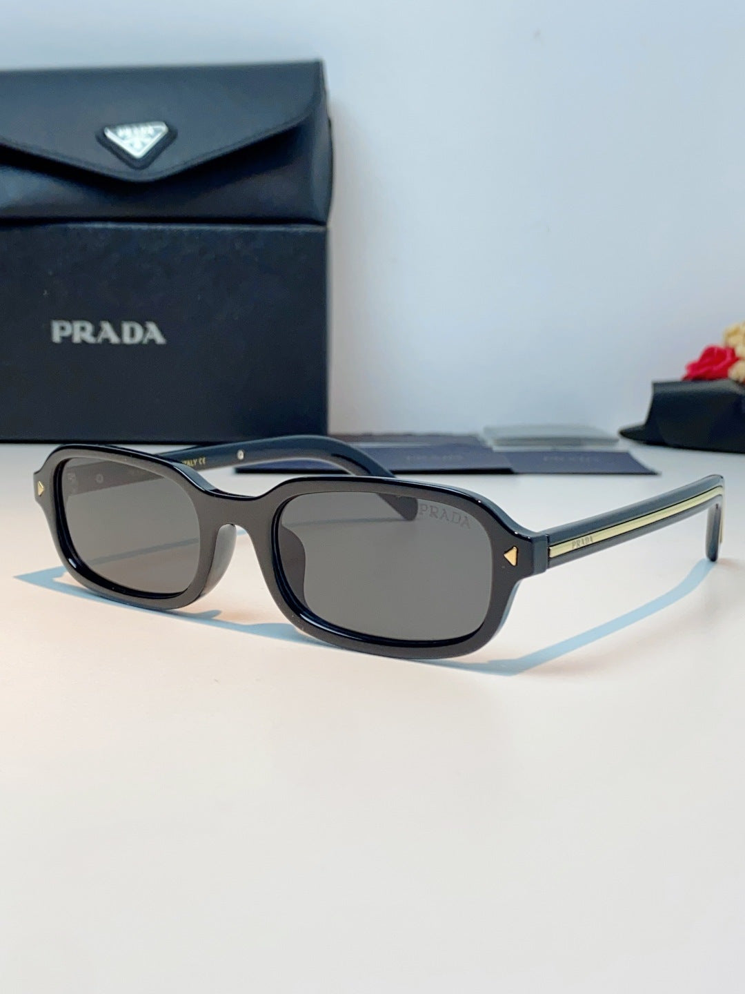 Prada Metal Oval Gray Lens Sunglasses for Men & Women - 382675