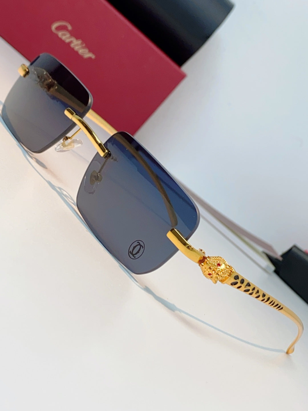 Cartier Lightweight Rimless Blue Lens Sunglasses for Men - detail image 7