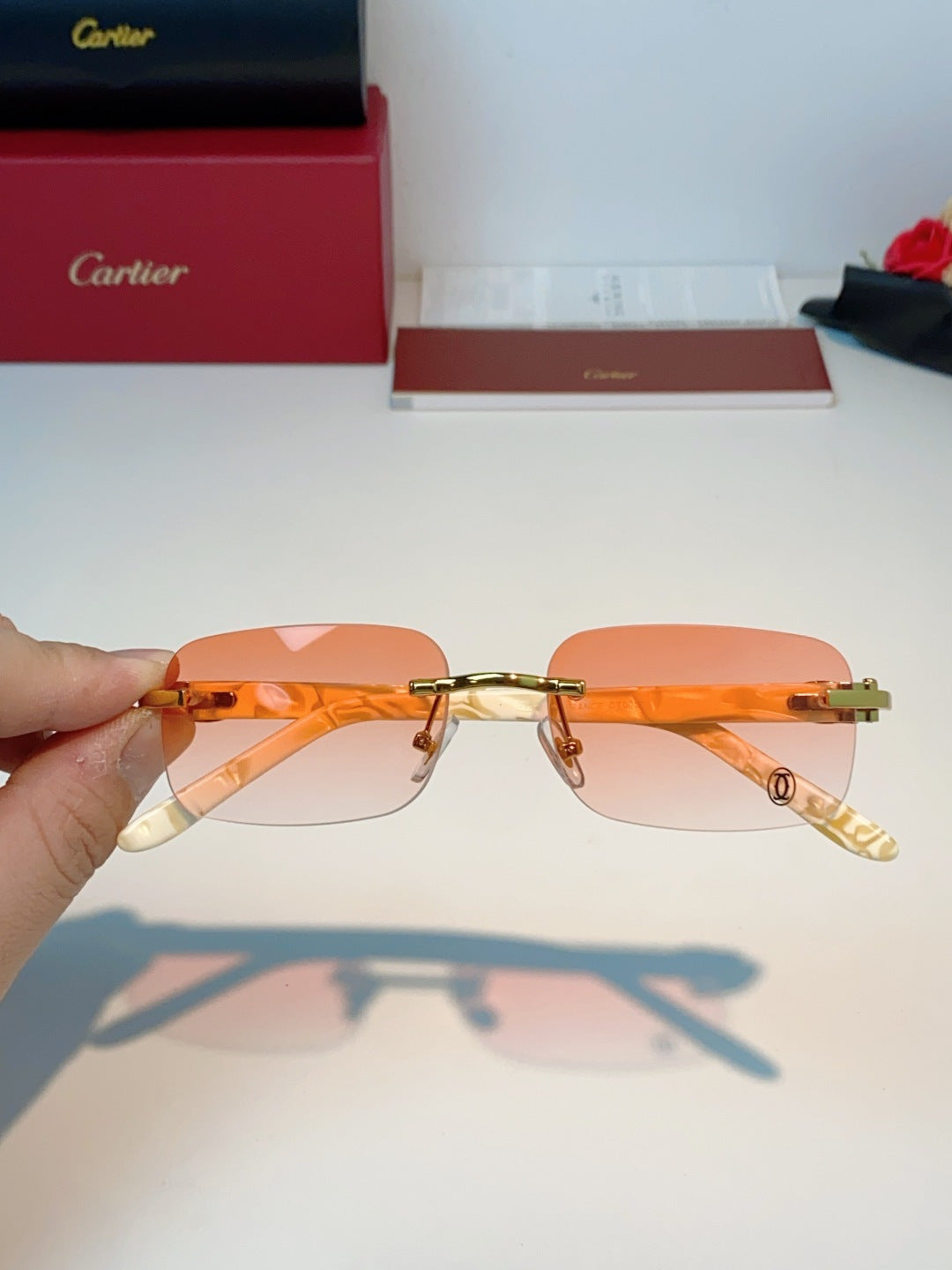 Cartier Lightweight Metal Rimless Orange Lens Sunglasses for Men - detail image 4