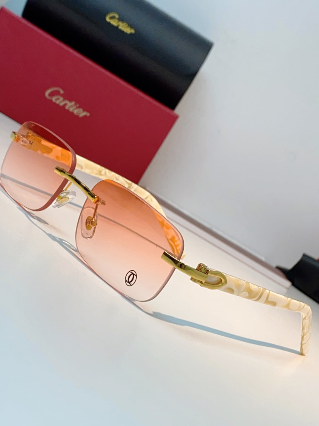 Cartier Lightweight Metal Rimless Orange Lens Sunglasses for Men - detail image 7
