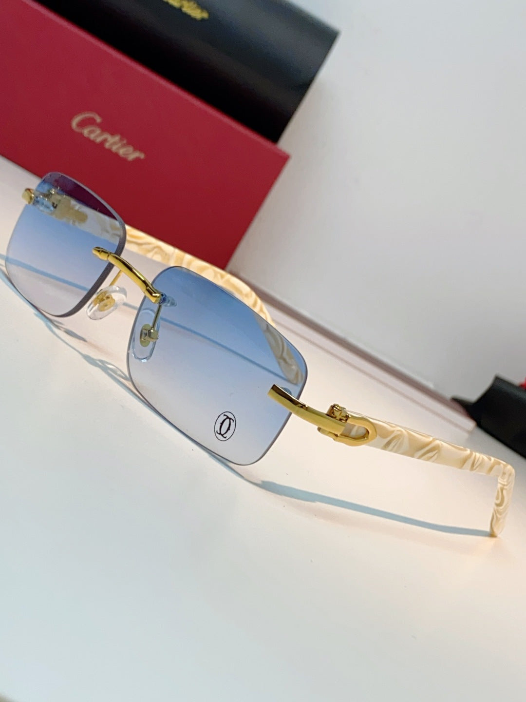 Cartier Lightweight Metal Rimless Blue Lens Sunglasses for Men - detail image 7