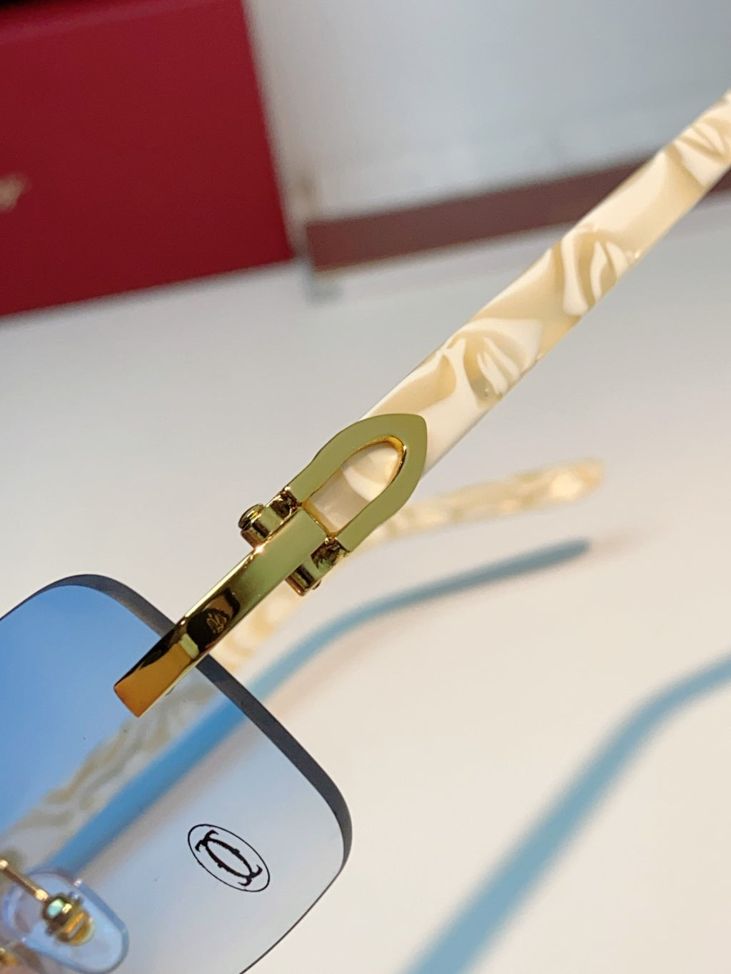 Cartier Lightweight Metal Rimless Blue Lens Sunglasses for Men - detail image 8