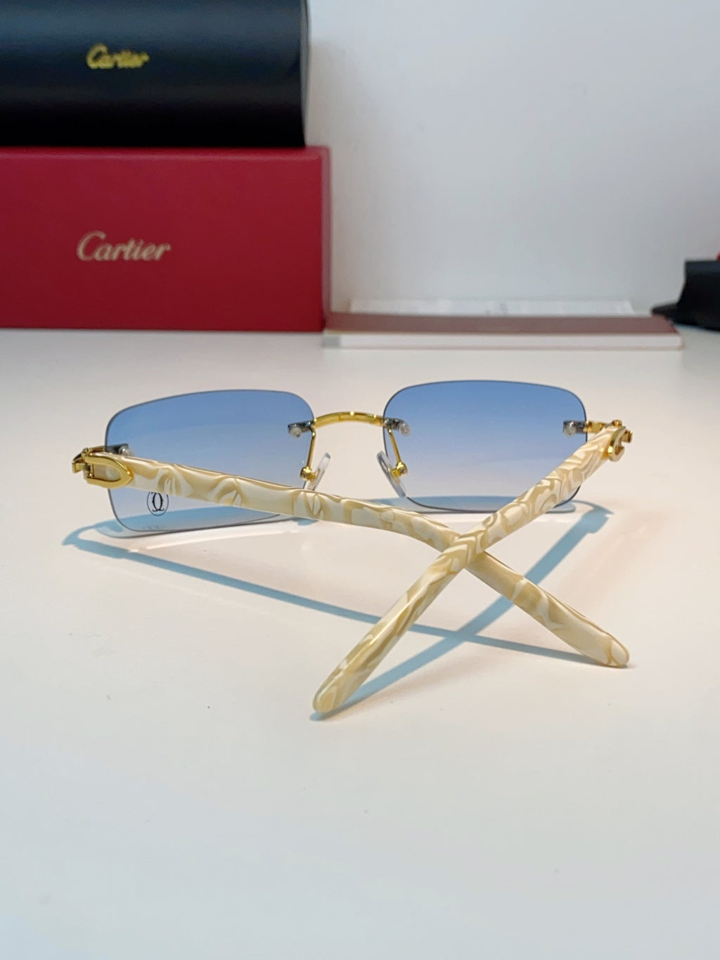 Cartier Lightweight Metal Rimless Blue Lens Sunglasses for Men - detail image 3