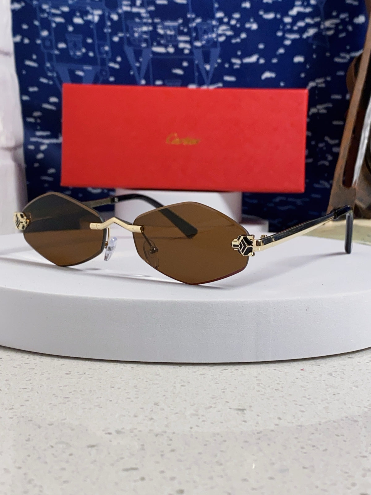 Cartier Lightweight Metal Rimless Brown Lens Sunglasses for Women