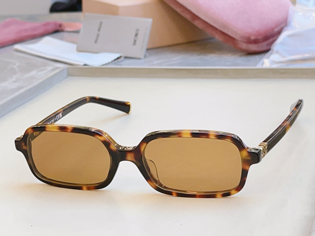 Miu Miu 11Z-F Fashion Orange Lens Sunglasses for Men & Women
