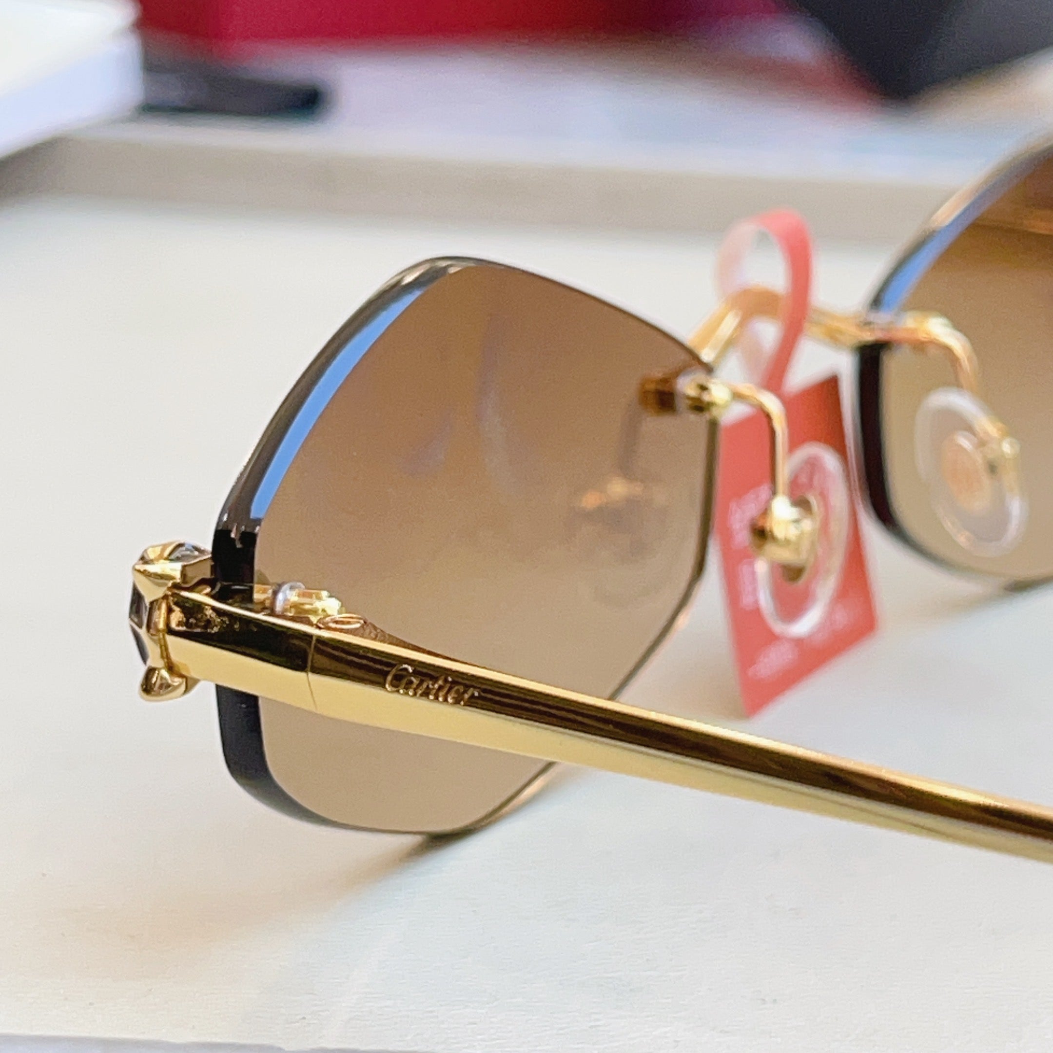 Cartier CT0433S Fashion Red Lens Sunglasses for Men & Women - detail image 6