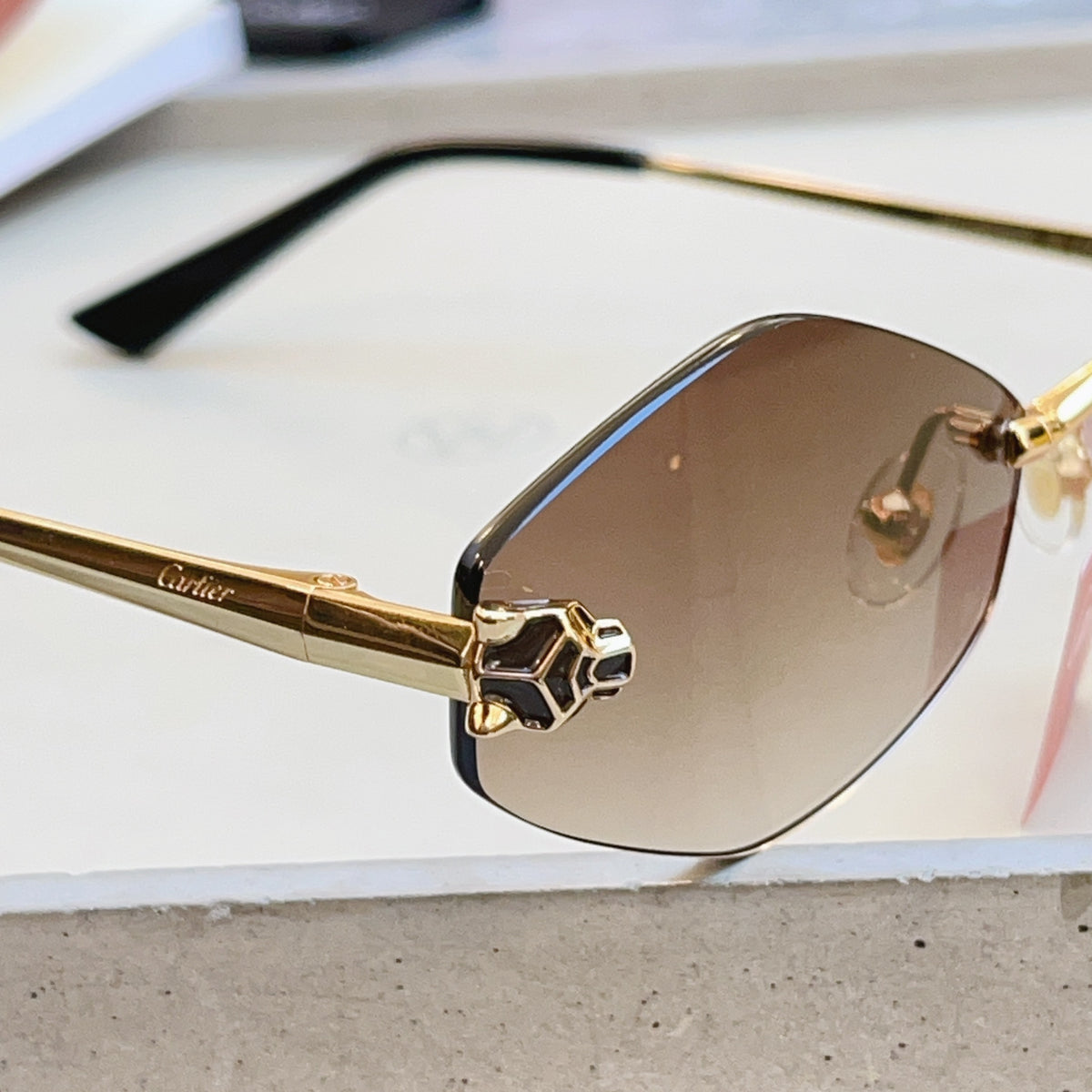 Cartier CT0433S Fashion Red Lens Sunglasses for Men & Women - detail image 4