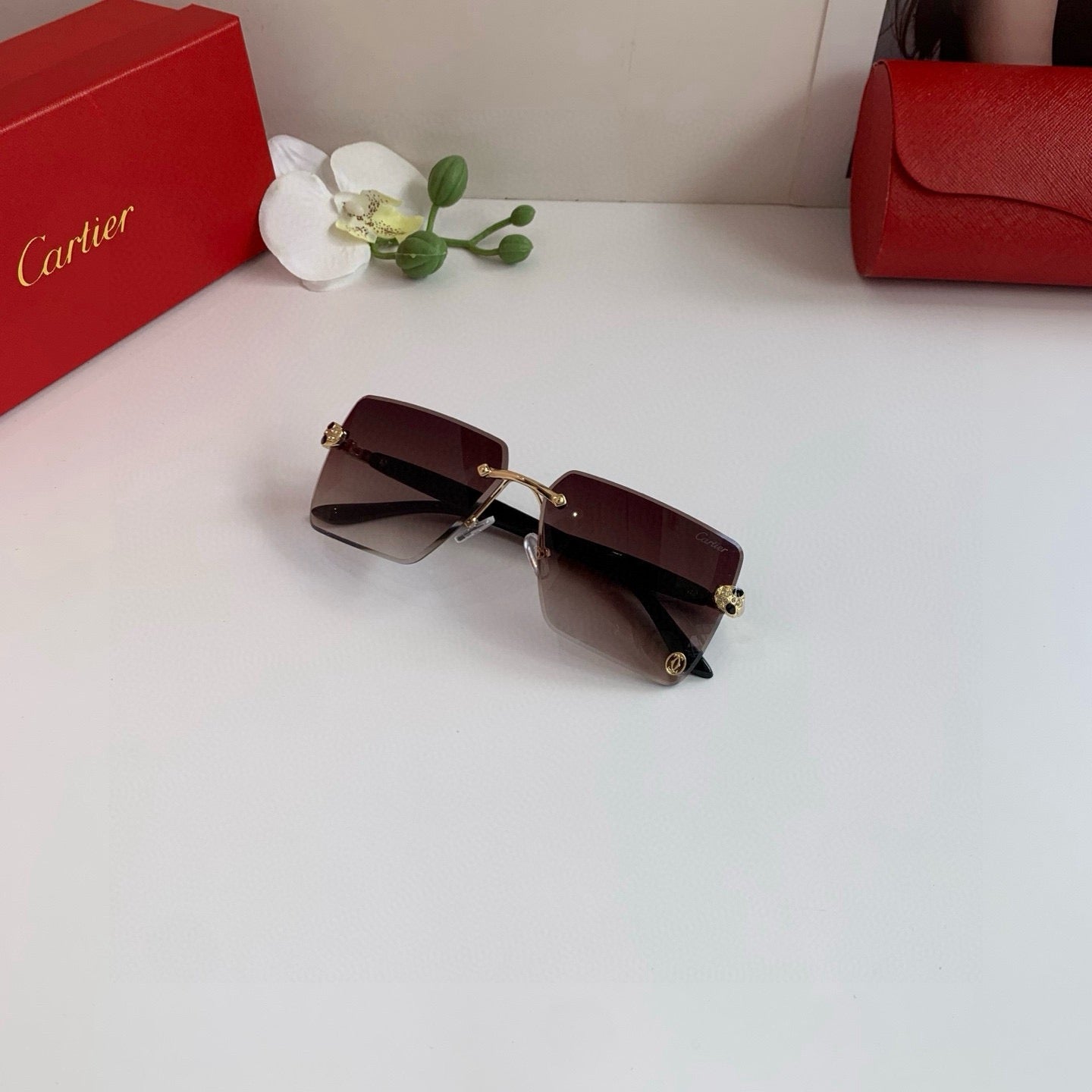 Cartier Lightweight Rimless Red Lens Sunglasses for Men & Women - 158487