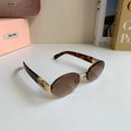 Miu Miu Round Brown Lens Sunglasses for Men & Women - 372425