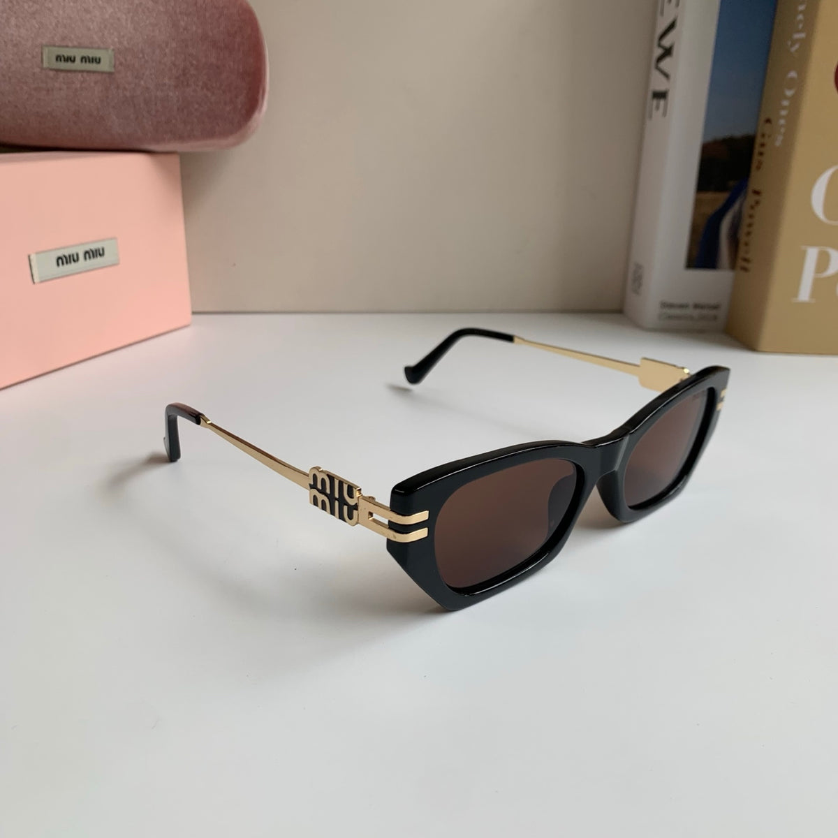 Miu Miu Cat-Eye Silver Lens Sunglasses for Men & Women - 487740